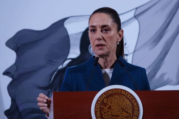 Mexico's President Claudia Sheinbaum at her daily press conference in front of the presidential podium