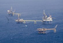 Floating rigs of a Pemex offshore oil drilling field, made possible by suppliers of goods and services