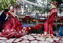 Dancers sculpted out of radishes as part of Oaxaca's Night of the Radishes