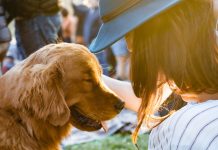 A woman and her golden retriever