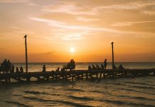 A beautiful sunset in Holbox island's wooden pier.