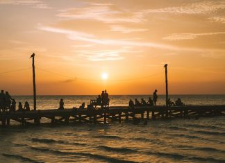 A beautiful sunset in Holbox island's wooden pier.