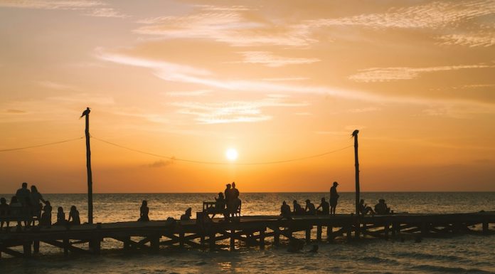 A beautiful sunset in Holbox island's wooden pier.