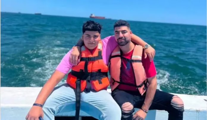 Jason Peña and his brother on vacation