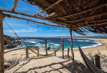 Playa Mayto in Jalisco as seen from within a beach hut. Hammock in foreground