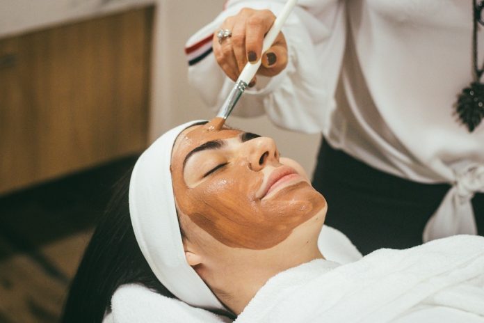 A woman enjoying herself with a massage.