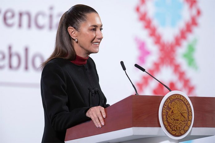 Mexican President Claudia Sheinbaum stands at a podium at her morning press conference, where she discussed a recent New York Times report on fentanyl production in Sinaloa