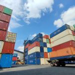 Shipping containers in a shipyard