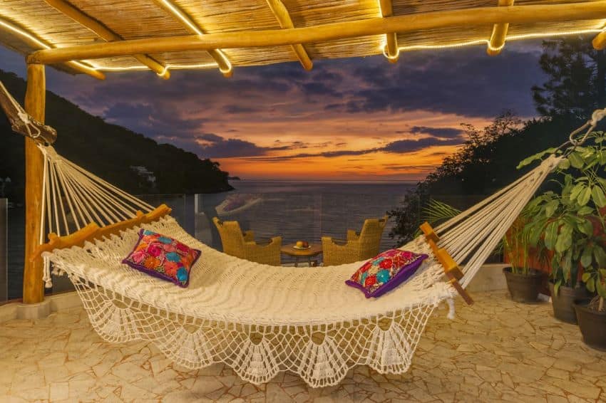 hammock in front of a sunset